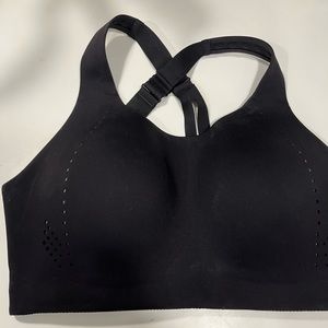 Lululemon sports bra. Black. Never worn. Size 34DD